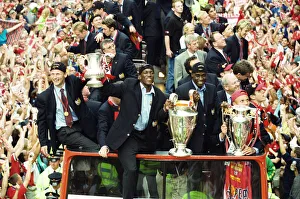 Manchester United celebrate winning the treble as the jubilant team make their way