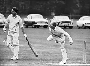 00105 Prints: Manchester United and England footballer Bobby Charlton bowling to take two wickets in