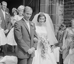 Bouquet Prints: Manchester United and England footballer Bobby Charlton with his bride
