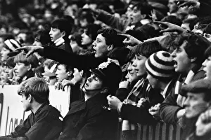 00237 Prints: Manchester United fans fail to win the support of a policeman in 1966