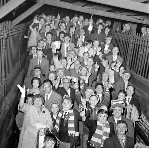 Manchester United fans return home from Wembley following their team