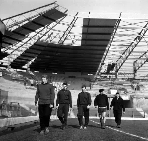 Manchester United Football Players training under the new cantilever stand at Old
