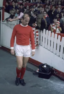 Manchester United footballer Bobby Charlton walks out fromn the tunnel onto the pitch