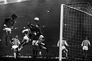 Manchester United footballer George Best in action to score his second goal with a header