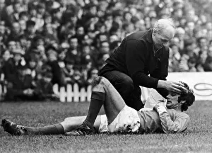 Trainer Prints: Manchester United footballer George Best attended to by trainer Jack Crompton after
