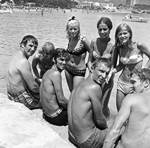00475 Prints: Manchester United footballer George Best with friends including Mike Summerbee cool off