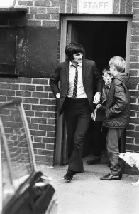 Boys Prints: Manchester United footballer George Best leaving Old Trafford after receiving treatment