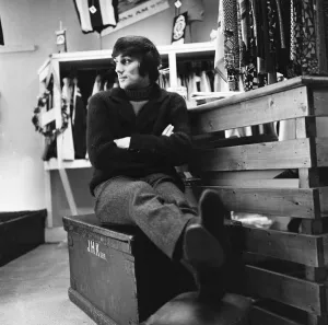 00475 Prints: Manchester United footballer George Best in his Manchester boutique