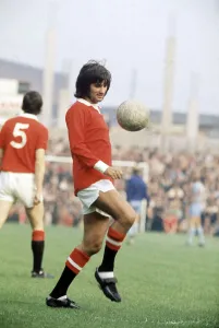 Skill Prints: Manchester United footballer George Best warming up ahead of his side