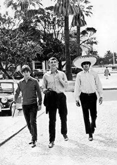 Manchester United footballer George Best wearing sombrero hat following his triumphant