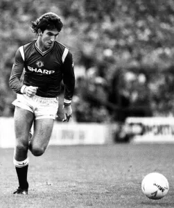 Manchester United footballer Norman Whiteside on the ball during the league match against