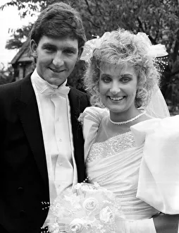 Manchester United footballer Norman Whiteside with his bride on their wedding day