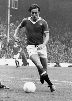 00357 Prints: Manchester United footballer Sammy McIlroy on the ball during the League Division One
