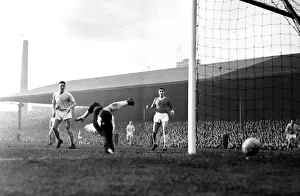 00238 Prints: Manchester United goalkeper Harry Gregg saves again during a Manchester City attack in