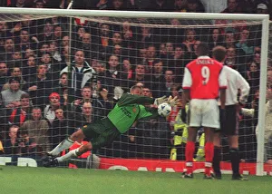 Manchester United keeper Peter Schmeichel makes a brilliant save from Arsenal