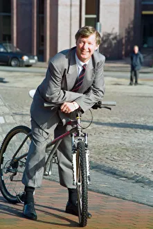 Manchester United manager Alex Ferguson pictured on a mountain bike after opening the new