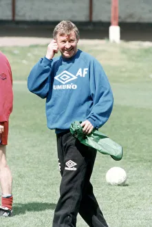 00468 Prints: Manchester United manager Alex Ferguson in relaxed mood during a team training session