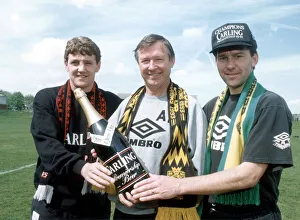 Manchester United manager Alex Ferguson smiles as he celebrates his team