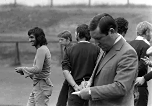 Coaching Prints: Manchester United manager Frank OFarrell taking notes during a training session with