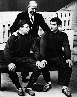 00372 Prints: Manchester United manger Matt Busby with two of his young players Roger Byrne (left