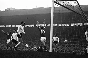 00387 Prints: Manchester United players celebrate after George Best (extreme left
