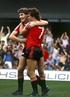 Manchester United players Norman Whiteside and Bryan Robson (7