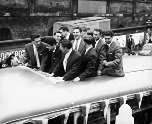 Manchester United return home. l-r Cope, Dawson, Violet, followed by Webster, Charlton