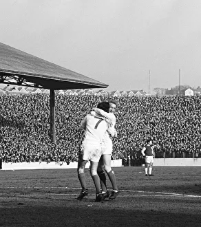 00328 Prints: Manchester United star George Best is celebrates with team mate Denis Law after scoring