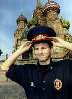 Salute Prints: Manchester United star Ryan Giggs poses wearing Russian military hat in front of St