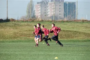 00838 Prints: Manchester United in training. David Beckham running with Gary and Phil Neville