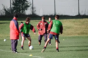 Ground Prints: Manchester United in training. Roy Keane on the ball challenged by David Beckham