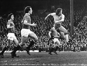 Manchester United v. Norwich. MacDougall thumps the ball past Stepney to score