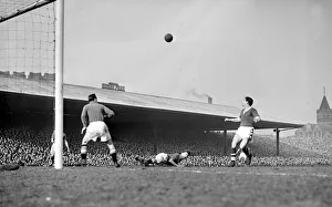 00238 Prints: Manchester United versus Cardiff City Roger Byrne heads almost into his own goal