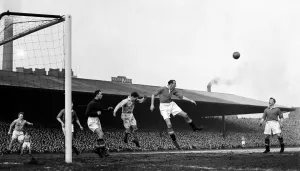 Manchester United versus Manchester City at Old Trafford Bill Foulkes clears United lines