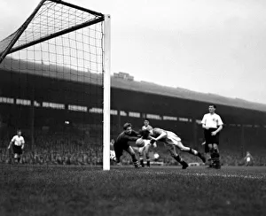 00238 Prints: Manchester United versus Preston North End Dennis Viollet leaps to score the thrd