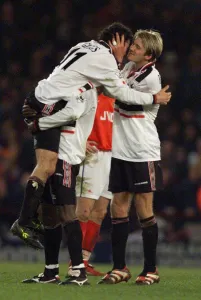 Manchester United winger David Beckham kisses team mate Ryan Giggs after scored in