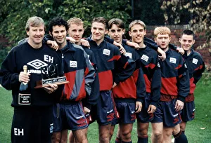 Team Prints: Manchester United youth team coach Eric Harrison is awarded a bottle of champagne