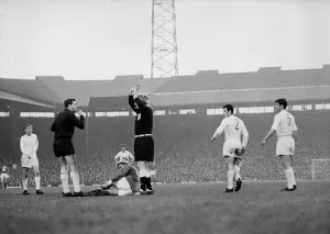 Manchester Uniteds Denis Law lies injured on the ground against Real Madrid in