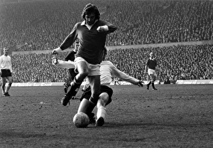 00240 Prints: Manchester Uniteds George Best is challenge by Stoke defender March 1972