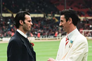 White Suit Prints: Manchester Uniteds Ryan Giggs (left) comes face to face with Liverpool