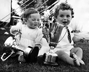 Mandy Turnbull (left) and Roger O Brien proudly display the trophies which prove