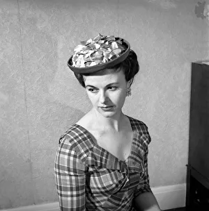 Mannequins modelling the 1956 spring / summer hat collection. April 1956