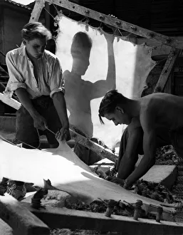 Shadows Prints: Manufacture of Vellum. Here are the boys stretching vellum skins on frames for
