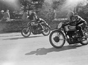 00002 Prints: Manx grand Prix Isle of Man 1951 D L Bennett passes K W Swallow in Senior M. G. P