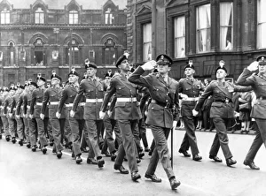 00066 Prints: A march past by the Royal Northumberland Fusiliers in front of the Station Hotel in