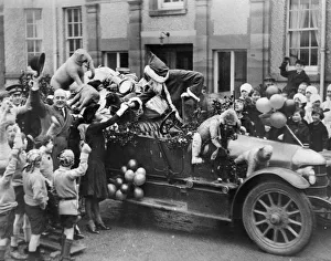 00518 Prints: Margaret Beavan meets a travelling Father Christmas circa 1927