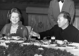 MARGARET THATCHER AND CHINESE PREMIER ZHAO ZIYANG AT A BANQUET IN THE GREAT HALL OF