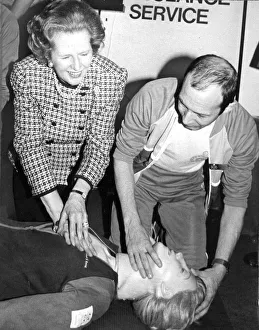 01528 Prints: Margaret Thatcher demonstration of artificial resuscitation on a dummy - May 1987