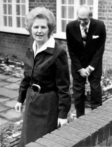 Margaret Thatcher and husband Denis Thatcher as she leaves for work - March 1977
