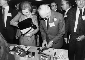 Margaret Thatcher and husband Denis using credit card at Tory party conference - October